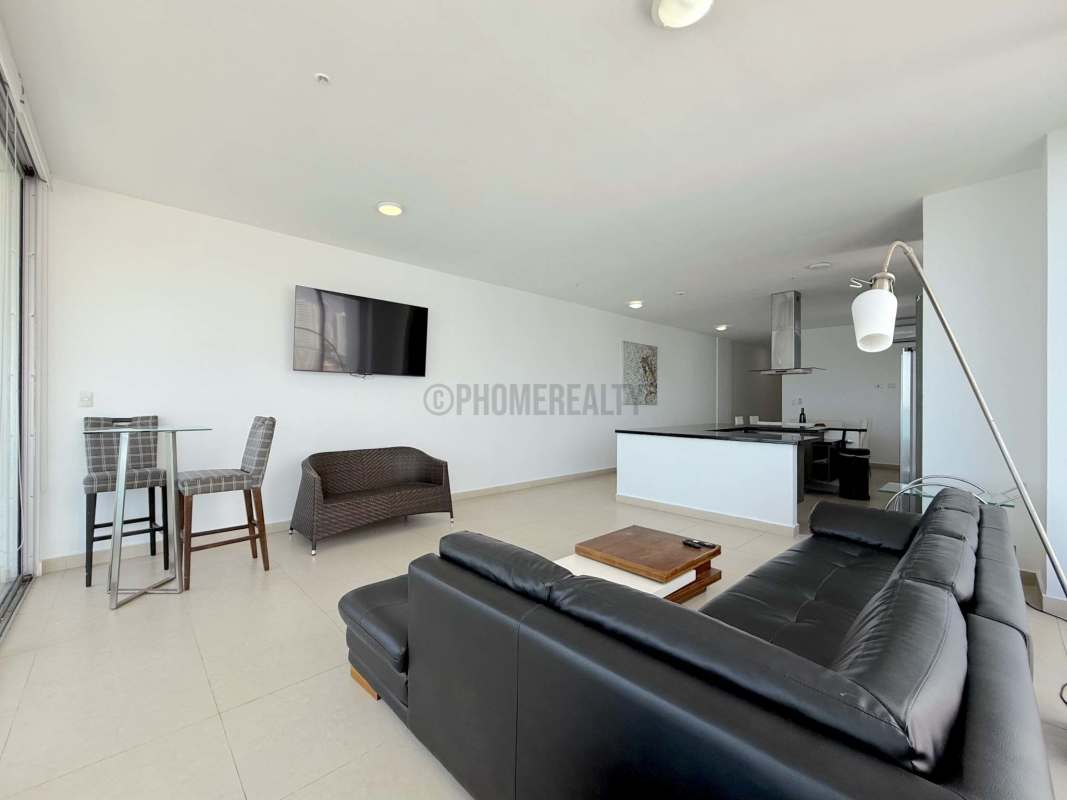 Dining room with ocean and skyline views at PH BICSA Avenida Balboa Panama