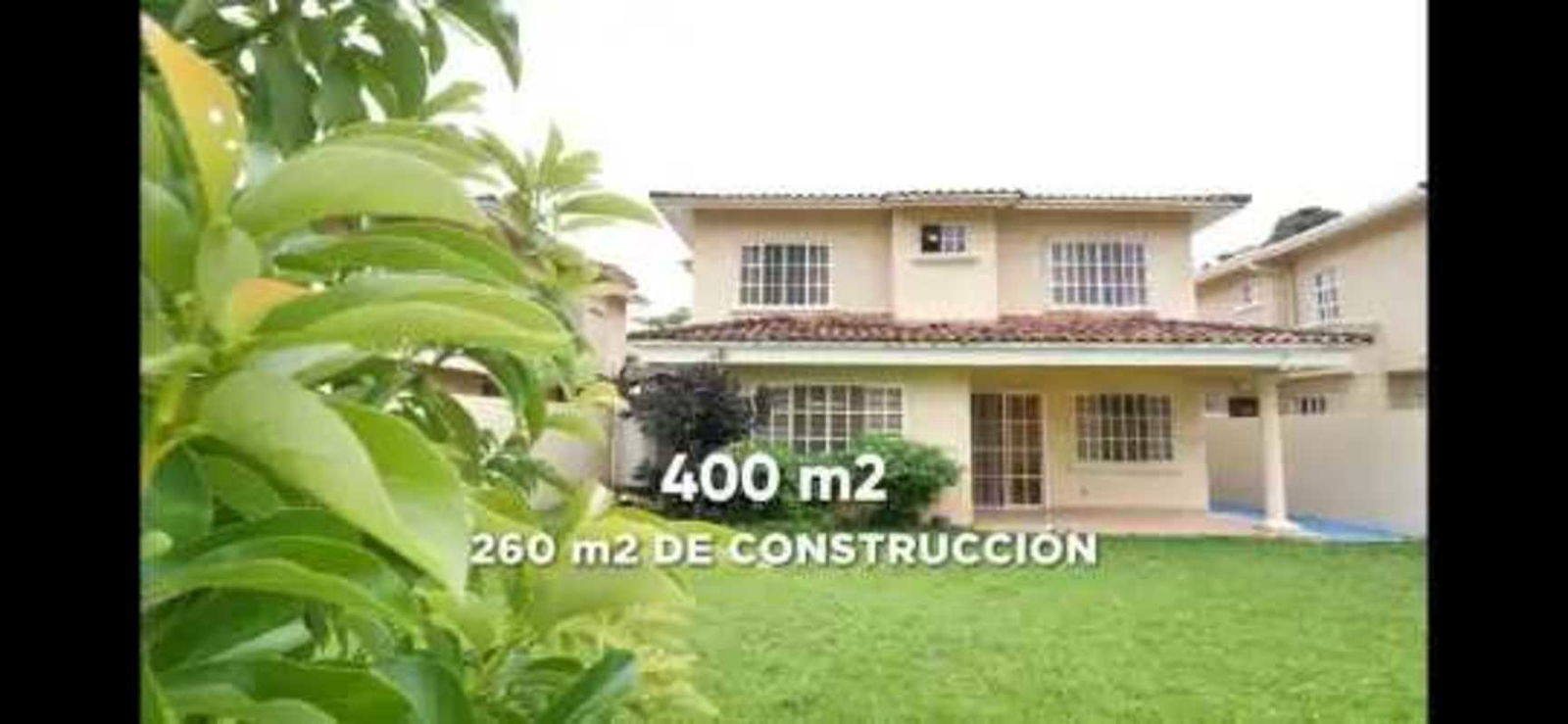 Upper level bright family room with large windows, zebra blinds, wood floors in Clayton Panama rental home