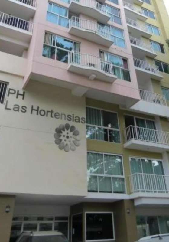 Lobby with sitting area elevator and reception in PH Las Hortensias Panama City
