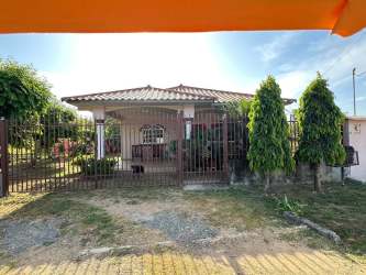 Traditional single-level house with gated fence and garden in Santa Ana Los Santos Panama