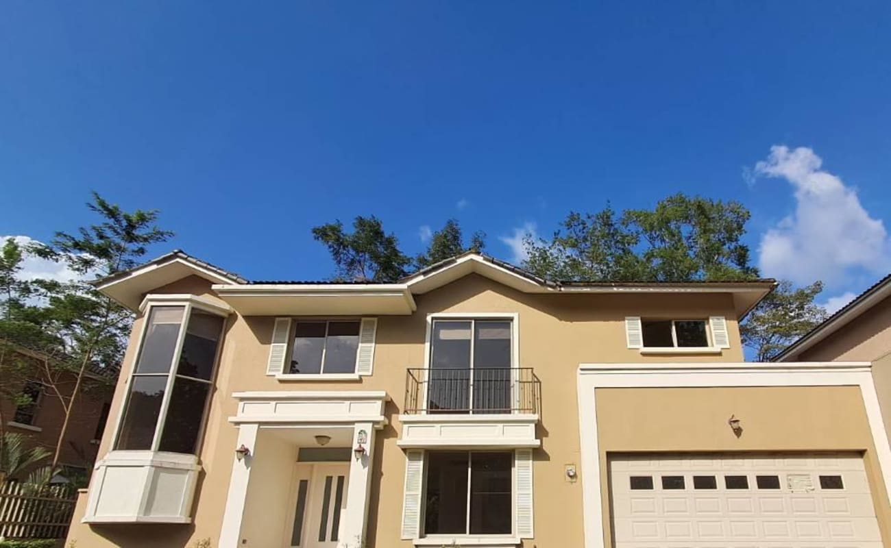 Contemporary interior staircase with iron rail and ceramic tile floors at Embassy Club Clayton Panama