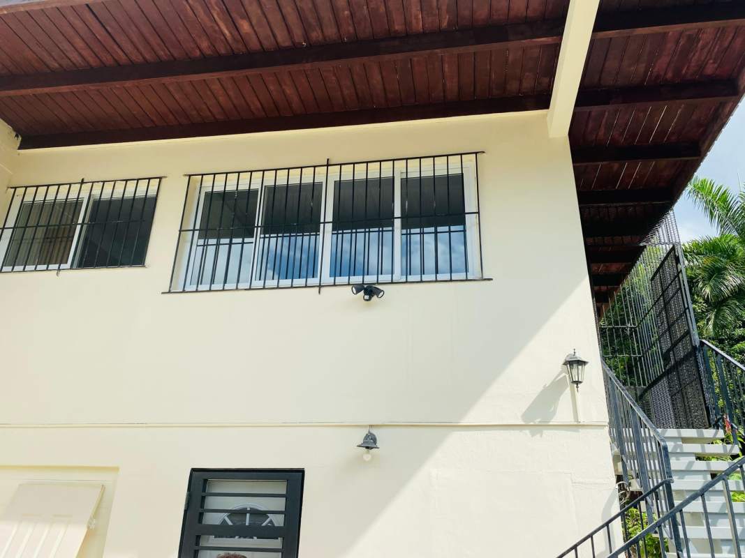 Secure entrance facade of judicial district office near Panama's Supreme Court