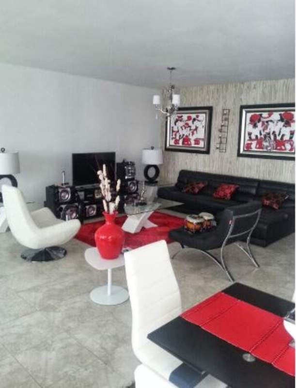 Modern living and dining room with accent wall, open plan layout PH Bella Vista Park Panama City