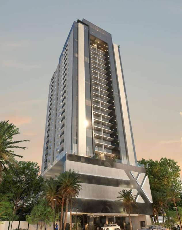 Modern glass and metal facade tower of PH X The Building in San Francisco Panama City