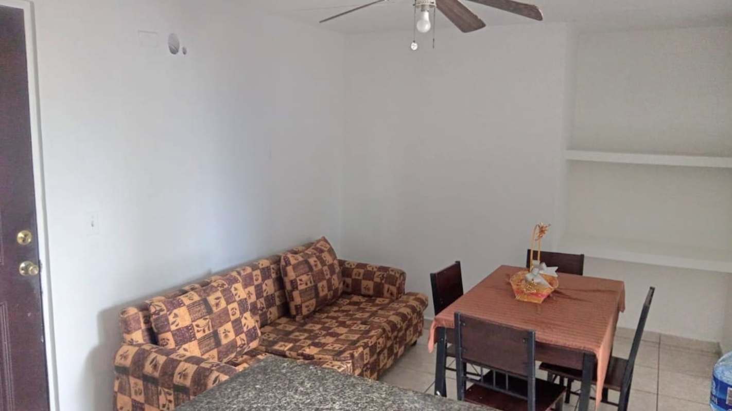 Bright living dining room with tile flooring and balcony access PH Carrasquilla Park Panama City