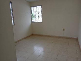 Empty interior room with tiled floor and glass block window Puerto Caimito house for rent Panama