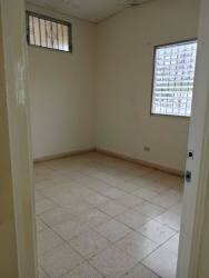 Private backyard with green lawn and clothesline house for rent La Chorrera Panama