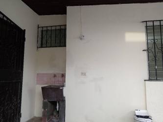 Bedroom with white walls and tiled floors in house for rent Puerto Caimito Panama