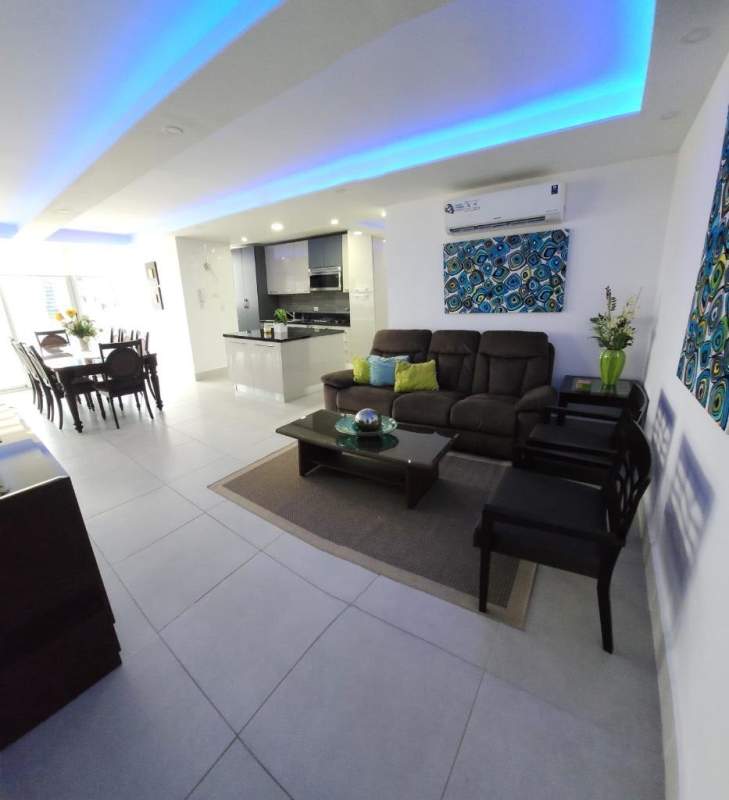 Modern living room area with open kitchen PH Cristal Park Obarrio Panama City