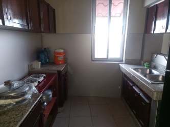 Large rooftop terrace with perforated brick wall, hammock, city views, Chitré apartment