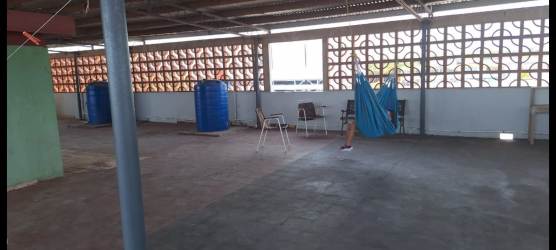 Covered rooftop patio with seating, hammock and partial roof view Chitré rental