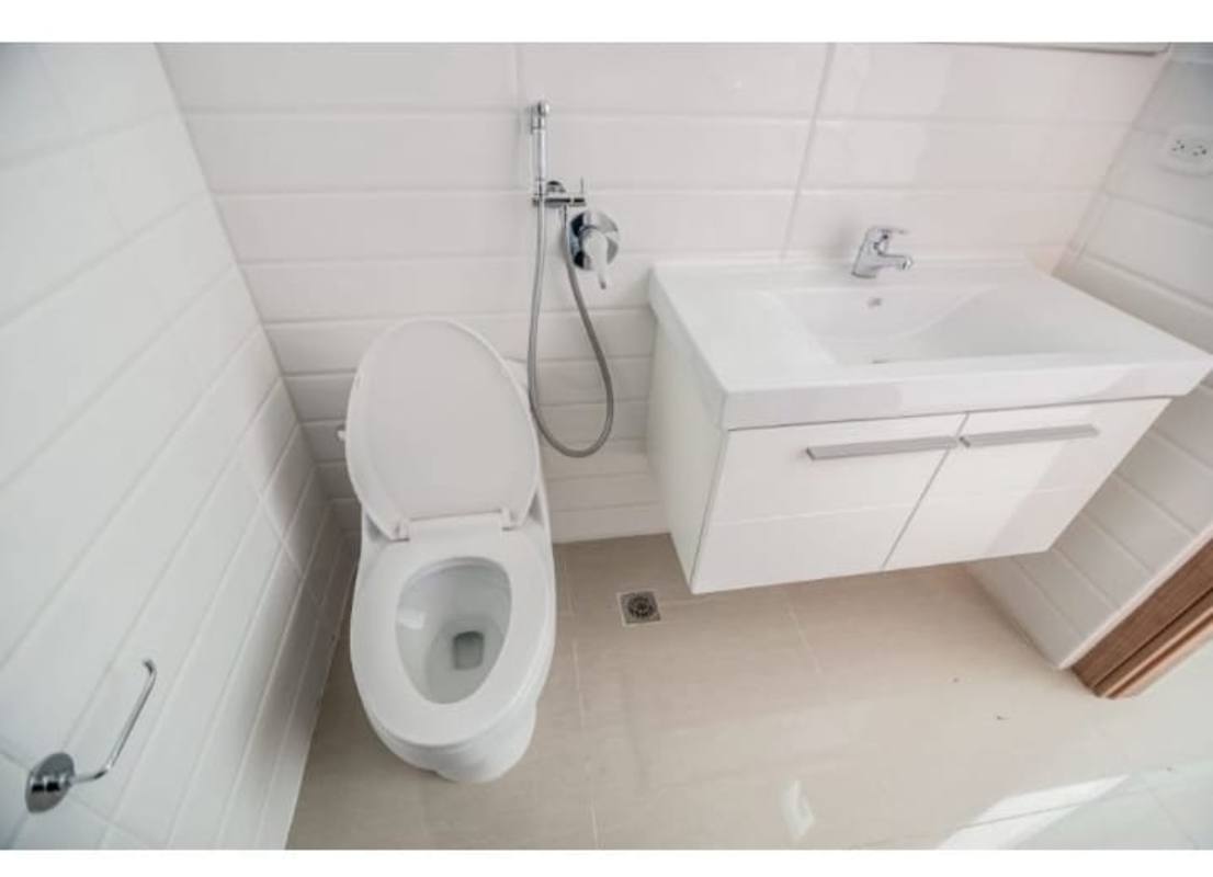 Contemporary kitchen with granite countertops and cabinetry at PH Roma San Francisco Panama