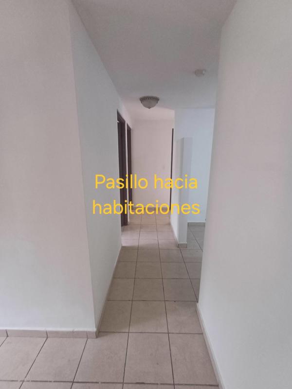 Open plan living dining room with tile flooring and ceiling fans in PH Altos de la Colina Panama City