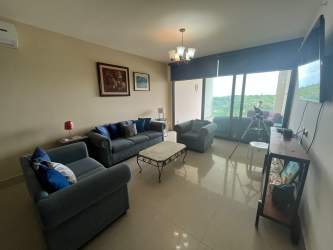 Spacious tiled balcony with glass railing and beach views PH Perlamar Casamar Panama