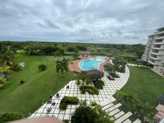Open kitchen with breakfast bar, dining and tile floors PH Perlamar Casamar San Carlos Panama