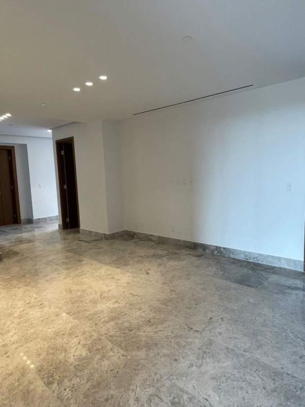 Luxury skyscraper facade with elegant entrance Empire Residences Santa Maria Panama City