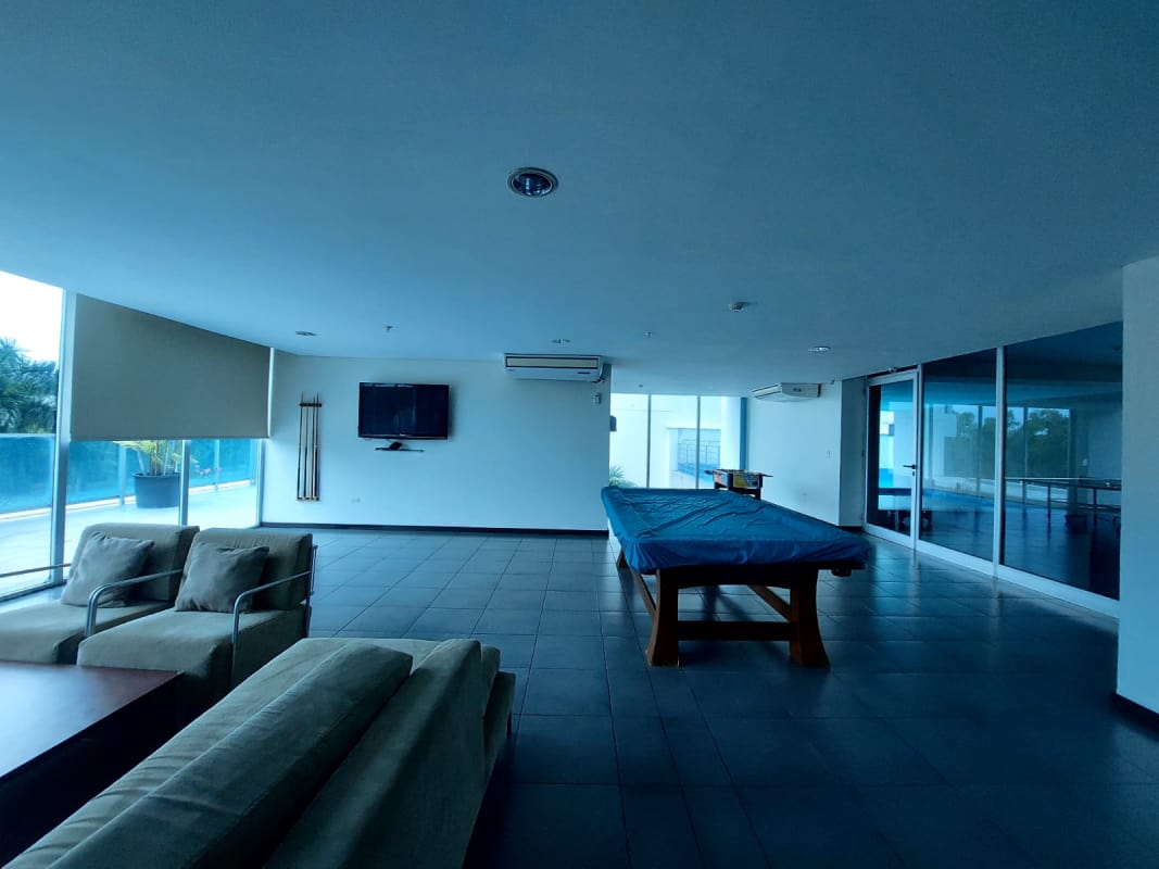 Spacious rec room with sofa billiard table TV at PH Bali Costa del Este Panama