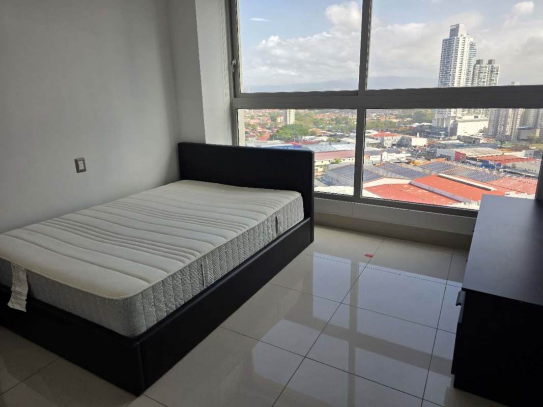 Minimalist bedroom in Costa del Este apartment with large window city views PH Bali