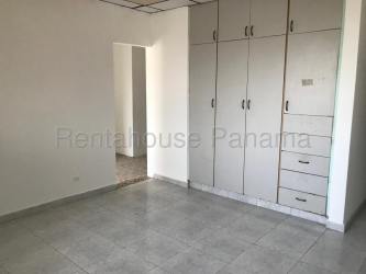 Spacious bedroom with tile floor built-in closet window bars in Jardines de Mastranto Chorrera Panama