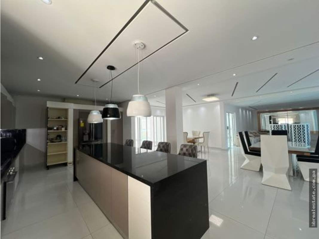 Modern wine cellar with wood storage and ambient lighting Costa del Este