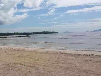 Bright open living area with ceramic tile floors in PH Las Olas Arraiján