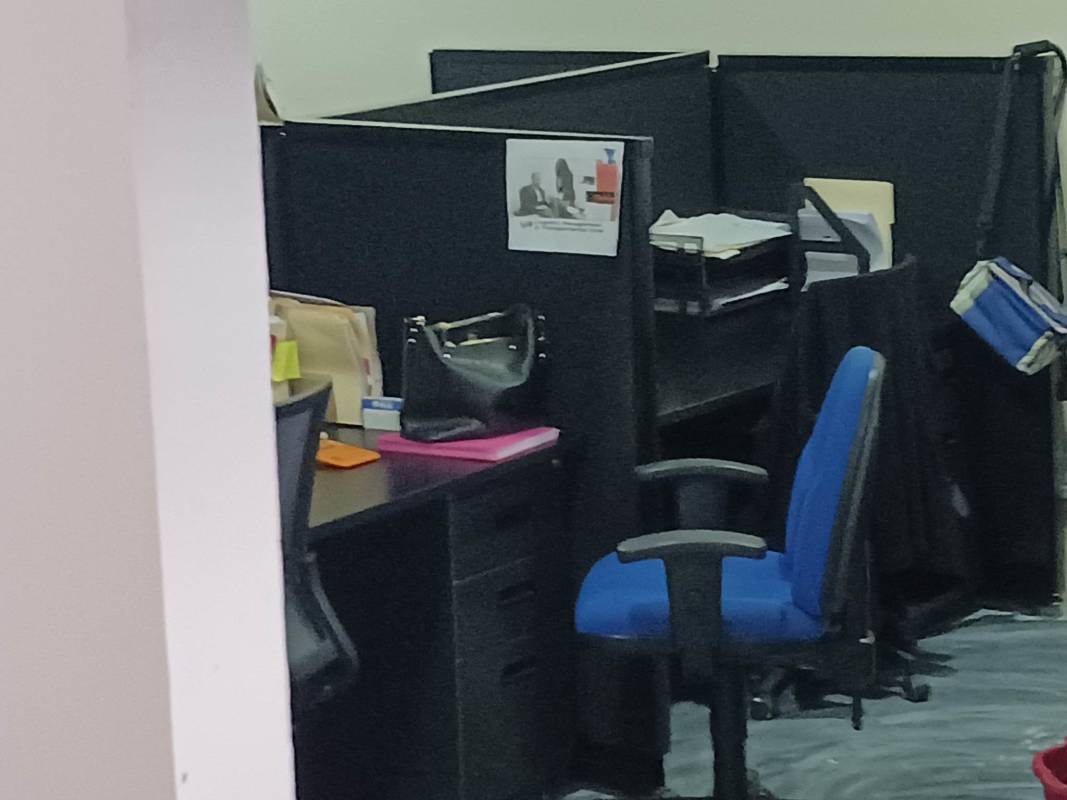 Minimalist meeting room with wooden table air conditioning and windows commercial property Betania Panama.