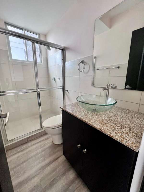 Outdoor swimming pool and sun deck in PH El Doral complex Panama City