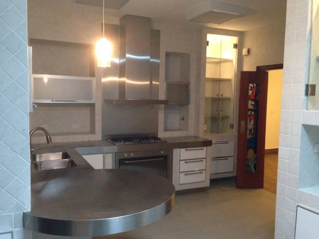 Remodeled kitchen with stainless steel counters and oven Embassy Gardens Panama