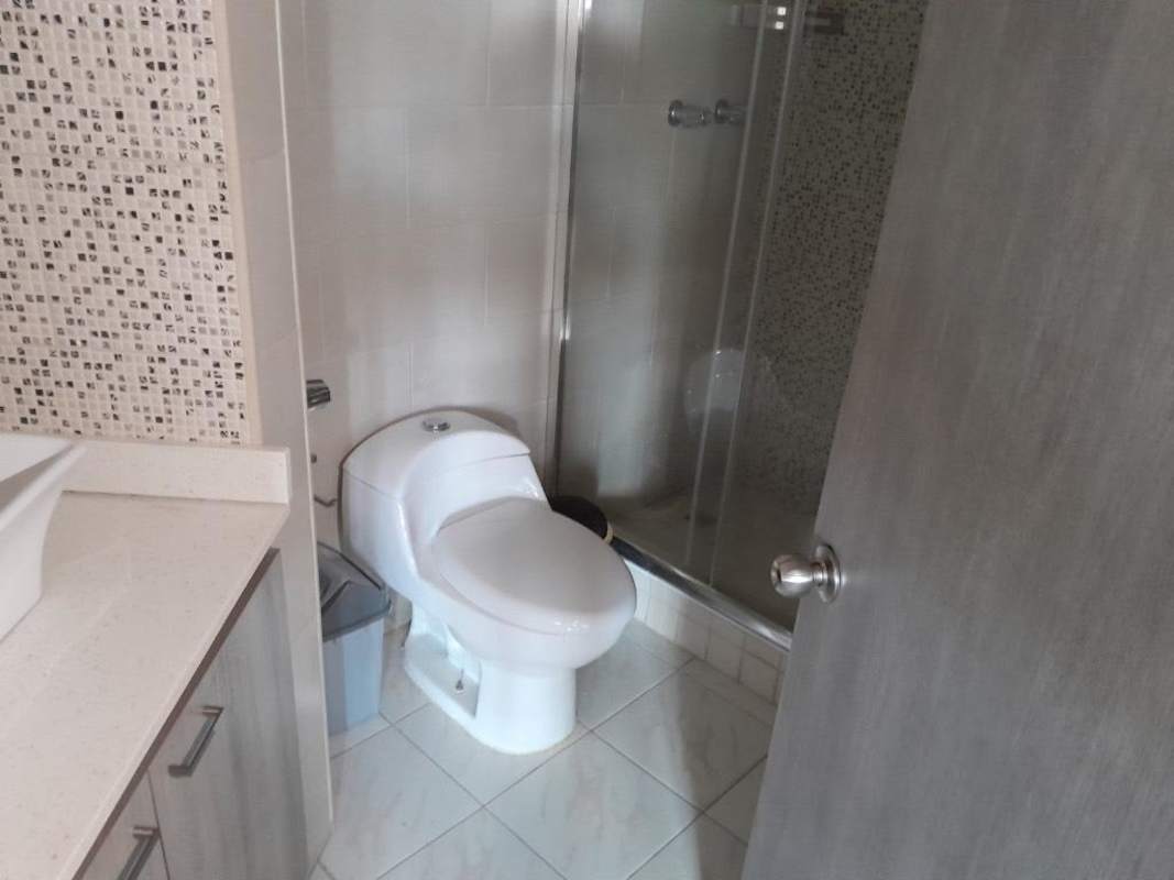 Contemporary bathroom with glass shower and mosaic tiles at PH Ibiza in Panama City