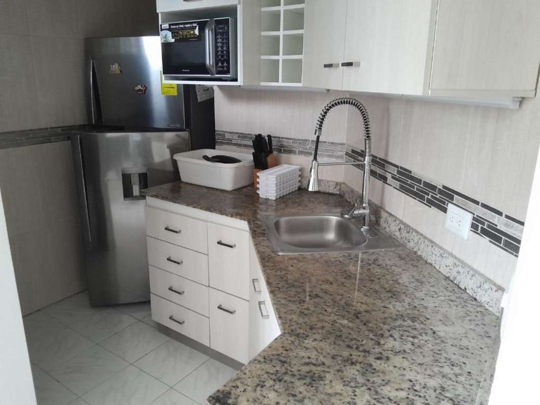 Living dining room with ample natural light at PH Ibiza in El Cangrejo Panama City