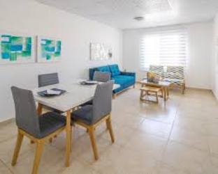 Spacious living dining room with ceramic floors and natural light in affordable new homes Panama Oeste