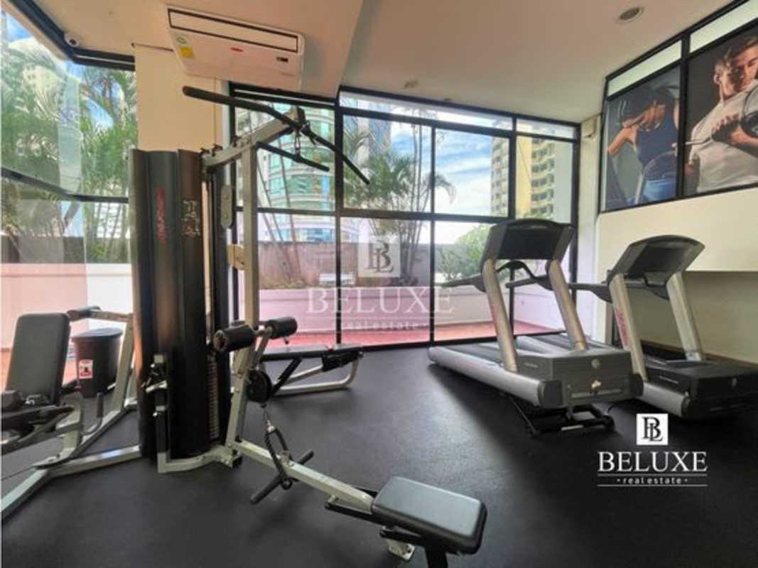 Bedroom with large windows, tile flooring and skyline views in PH Perlas del Pacífico Punta Paitilla