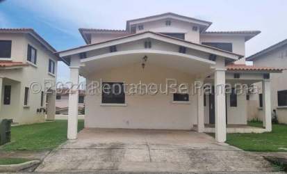 Two-story family house with covered carport Mediterranean design La Chorrera Panama