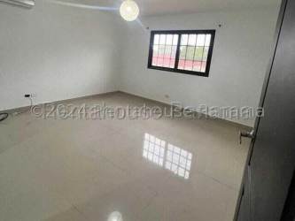 Empty bedroom with window tiles and AC modern house La Chorrera Panama