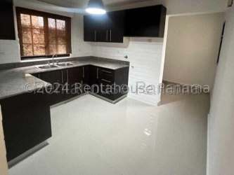 Modern bathroom decorative tiles sink and window in house La Chorrera Panama