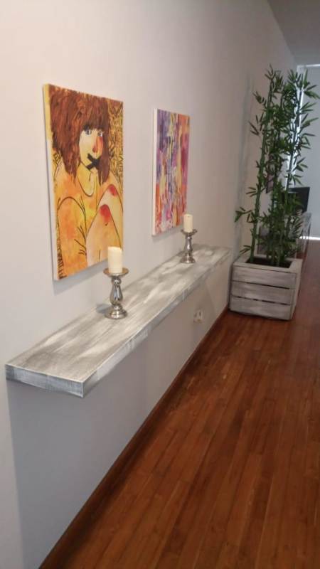 Contemporary kitchen with wooden cabinets, granite countertops, and appliances in Casco Viejo PH Star & Herald Panama City