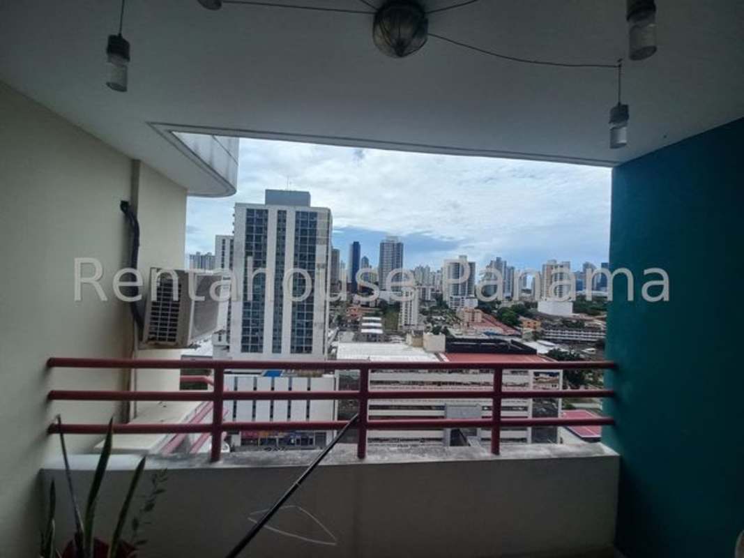 Full bathroom with ceramic tiled walls, white fixtures, walk-in shower in PH Vista Hermosa Via España Panama City