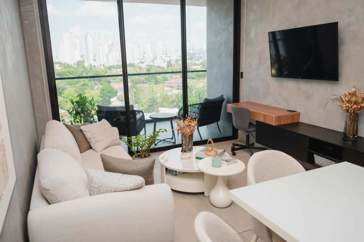 Dining area with large windows and panoramic city view Victory Wellness Tower Panama