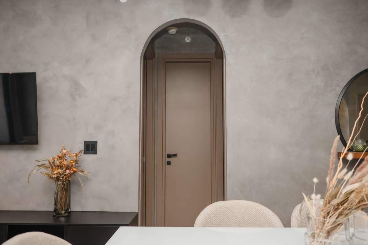 Modern kitchen island with quartz countertop and appliances Victory Wellness Tower Panama