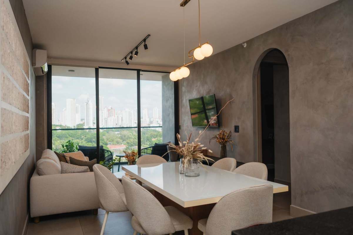 Bright modern living room with workspace and balcony Victory Wellness Tower Coco del Mar Panama
