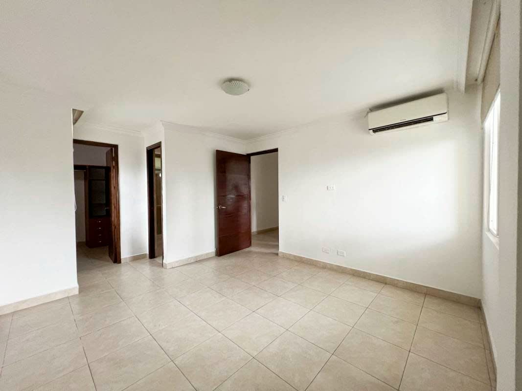 Bedroom with windows and AC at PH Obarrio Tower apartment Panama rental