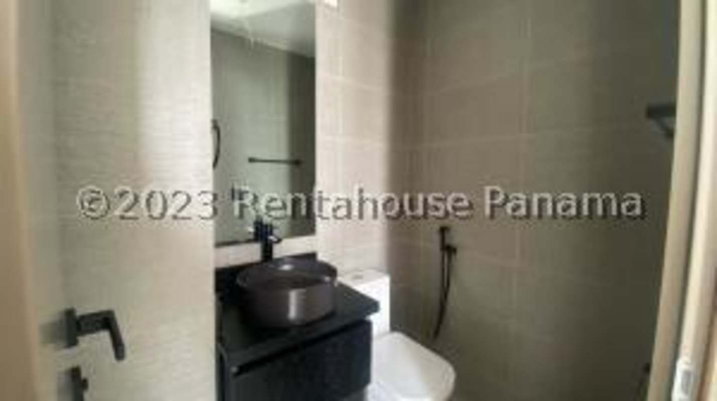 Modern rooftop paddle tennis court with skyline views in Victory Wellness Tower Panama