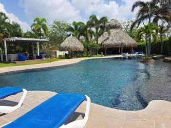 Tropical infinity pool facing Pacific Ocean at La Ensenada Resort San Carlos Panama
