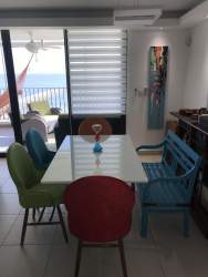 Contemporary kitchen with granite counters and sea views La Ensenada Resort San Carlos Panama