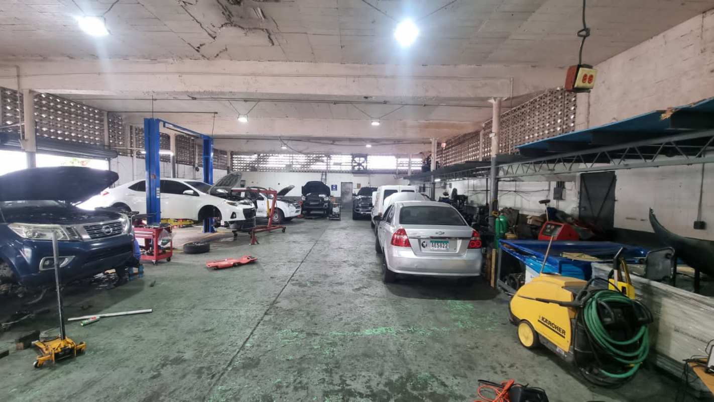 Street-facing view of commercial warehouse entrance with signage on Ernesto T Lefevre