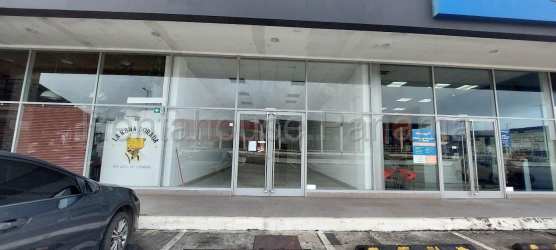Interior retail or office space in commercial unit Costa Verde La Chorrera Panama with tile floor and ceiling lights