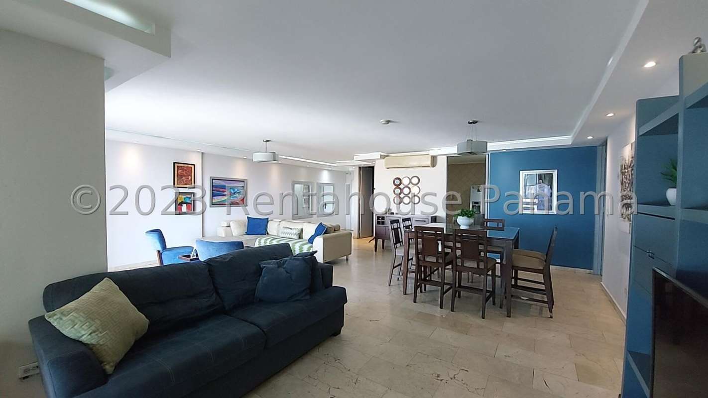 Bright dining area with large window and marble floors in PH Costa Pacifica Punta Pacifica