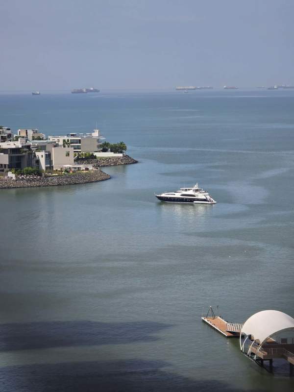 Master bedroom ocean view large windows luxury finishes PH Q Tower Punta Pacifica Panama