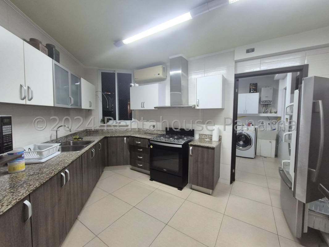 Modern kitchen with granite counters, appliances in PH Country Club Costa del Este Panama