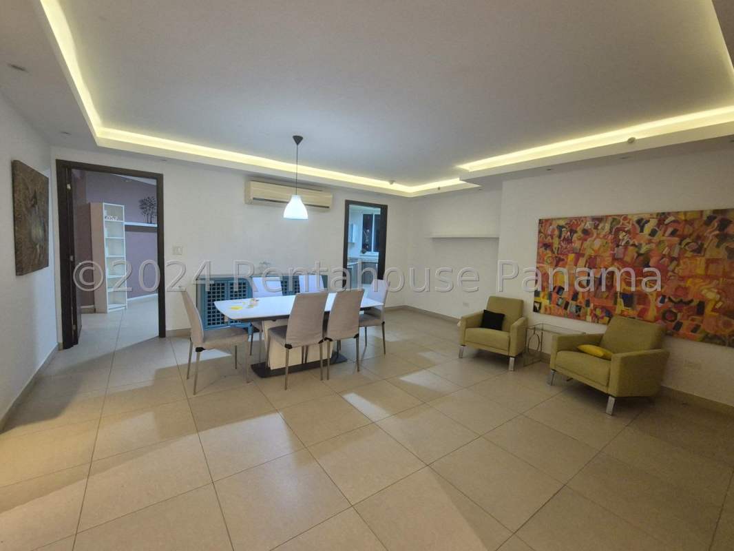 Bedroom featuring modern built-in closets and large window in PH Country Club Costa del Este Panama